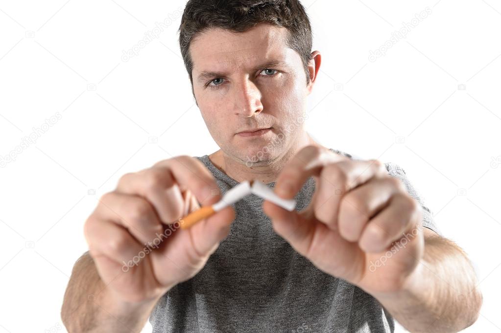 Attractive young man in Quit smoking resolution