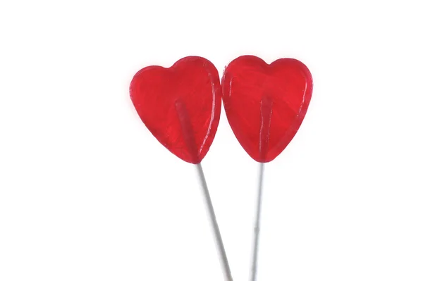 Couple de rouge forme de coeur sucettes en amour concept — Photo