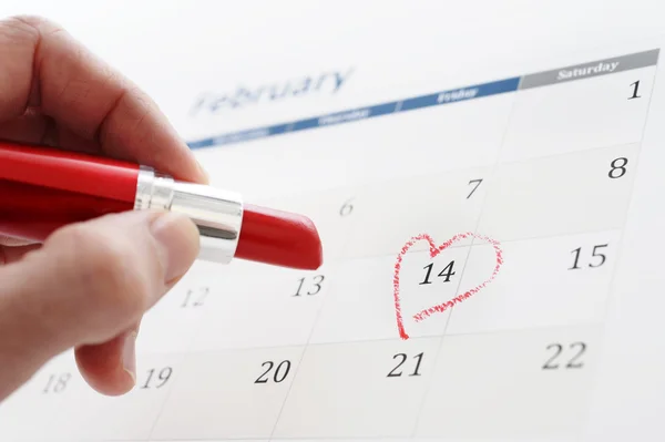 February calendar page and little red heart marking valentines day — Stock Photo, Image