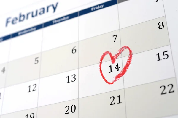 February calendar page and little red heart marking valentines day — Stock Photo, Image