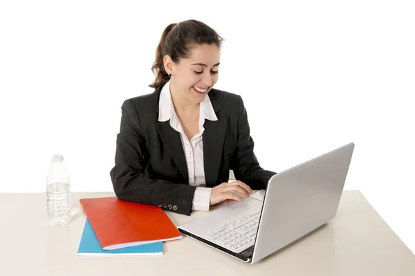 Happy business woman smiling working on her laptop — Stock Photo, Image