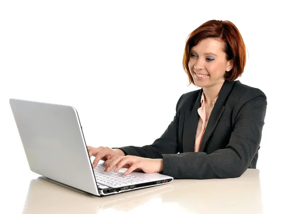 Happy business woman with red hair drinking coffee and smiling — Stock Photo, Image