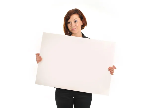 Happy busy business woman holding cardboard sign as copy space Stock Photo