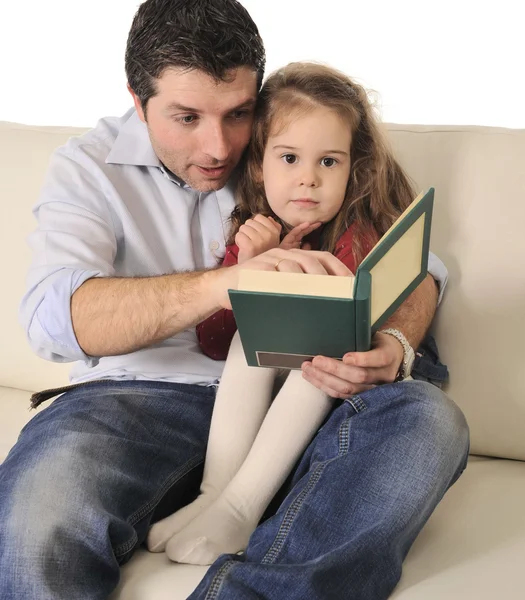 Father telling fairy tale to cute little daughter — Stock Photo, Image