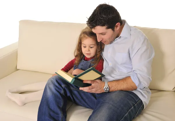 Father telling fairy tale to cute little daughter — Stock Photo, Image