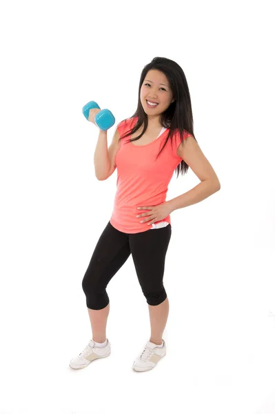 Happy asian woman wearing pink shirt holinf a dumbbell — Stock Photo, Image