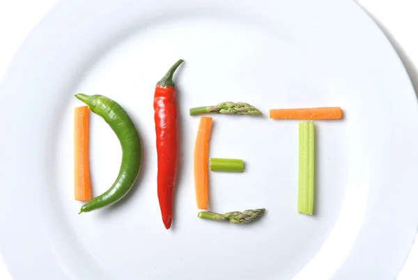 Dieta escrita com vegetais no conceito de nutrição saudável — Fotografia de Stock