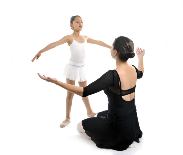 Young little girl ballerina learning dance lesson with ballet teacher — Stock Photo, Image