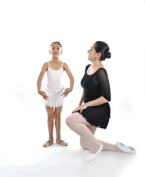 Young little girl ballerina learning dance lesson with ballet teacher — Stock Photo, Image