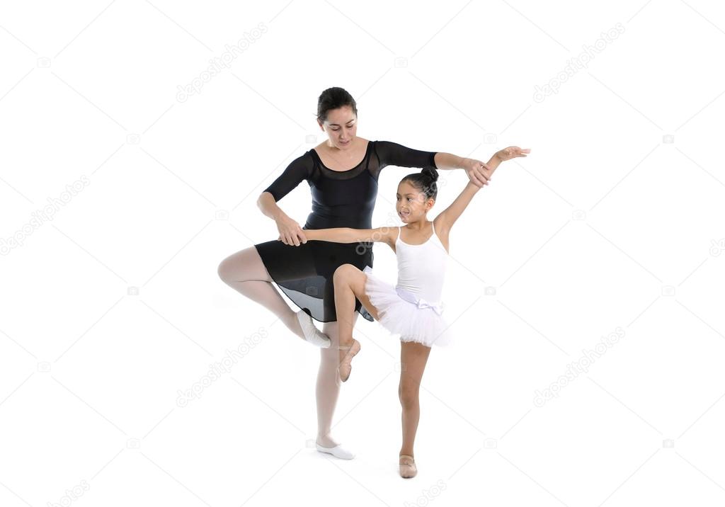 young little girl ballerina learning dance lesson with ballet teacher