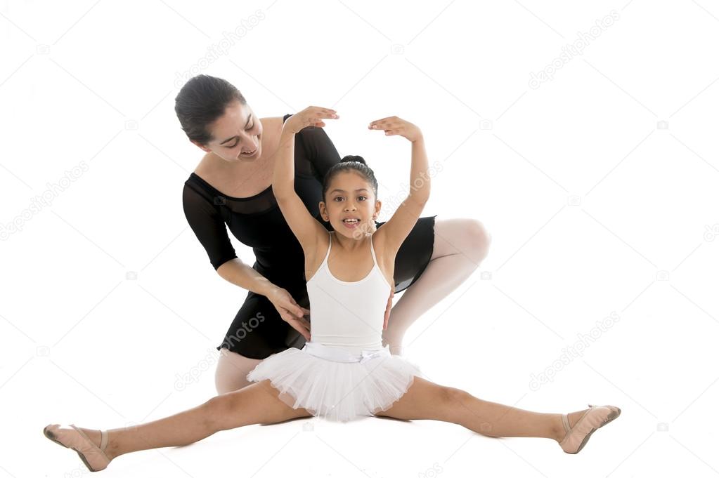cute little Ballerina dancer girl  learning ballet lesson from her teacher