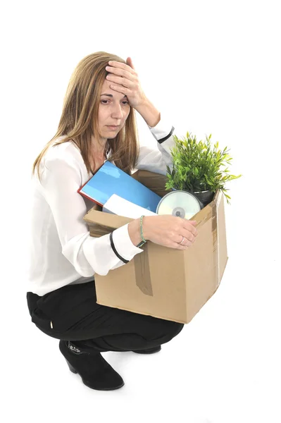 Triste mujer de negocios con caja de cartón disparada desde el trabajo —  Fotos de Stock