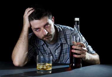drunk alcoholic man with whiskey glass and bottle in alcohol addiction and alcoholism concept clipart