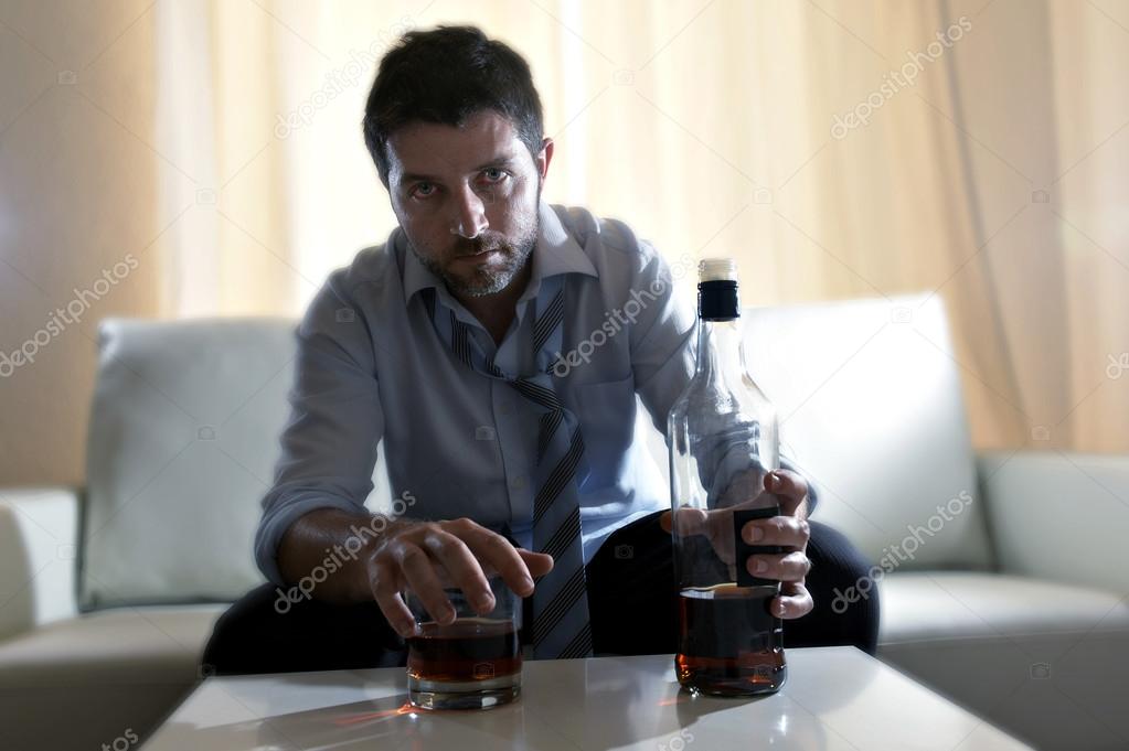 drunk business man wasted and whiskey bottle in alcoholism