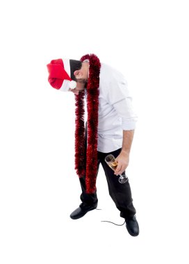 drunk businessman drinking champagne wearing a santa hat on whit clipart
