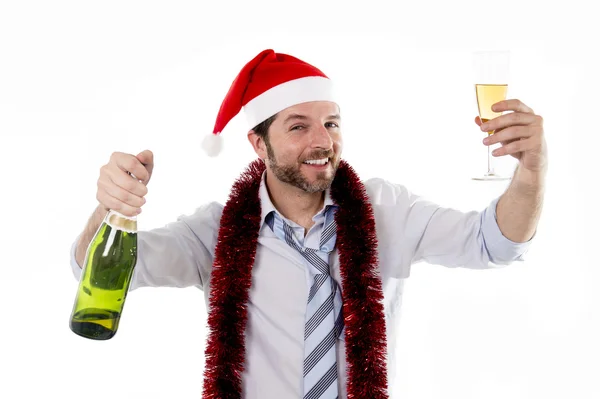 Zakenman drinken champagne dragen een kerstmuts op witte achterzijde Rechtenvrije Stockfoto's