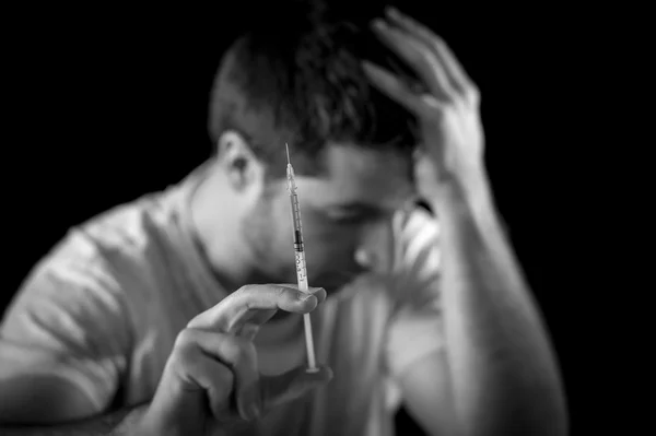 Close up of  Syringe and Needle and heroin drug addict — Stock Photo, Image