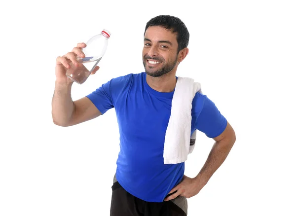 Young attractive and athletic sport man drinking water — Stock Photo, Image