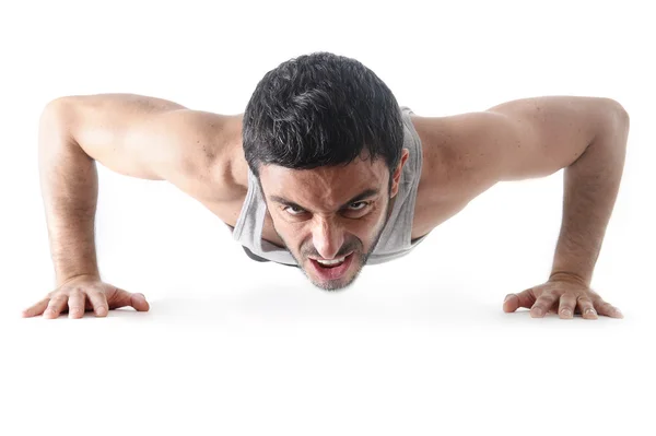 Привлекательный спорт человек тренировки толкать упражнения изолированы на белом фоне — стоковое фото