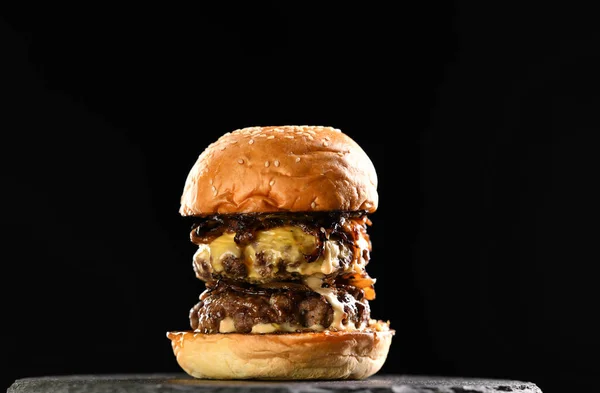 Meat Double Cheeseburger Caramelized Onion Black Plate Black Background — Stock Photo, Image