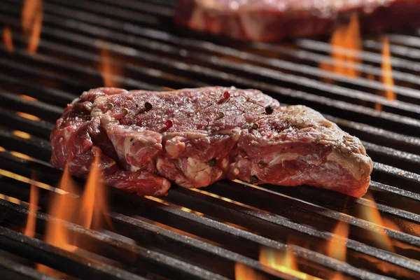 Raw Seansoned Rib Eye Steaks Meat Beef Cooking Flaming Grill — Stock Photo, Image