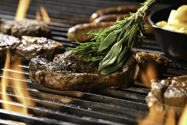 Cooked Juicy Steak Meat Beef Brushed Rosemary Flaming Grill Surrounded — Stock Photo, Image