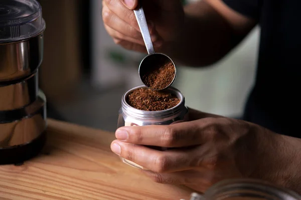 Moka pot with ground coffee — Stockfoto