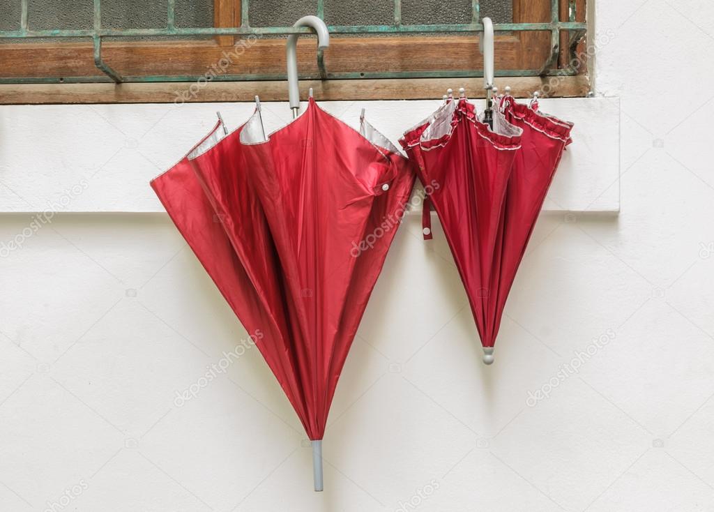 Pattern of umbrella hang on  window side