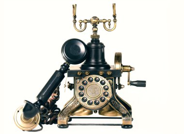Beyaz arkaplanda eski telefon