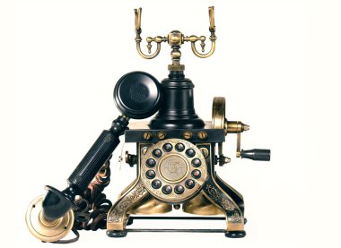 Old telephone on white background clipart