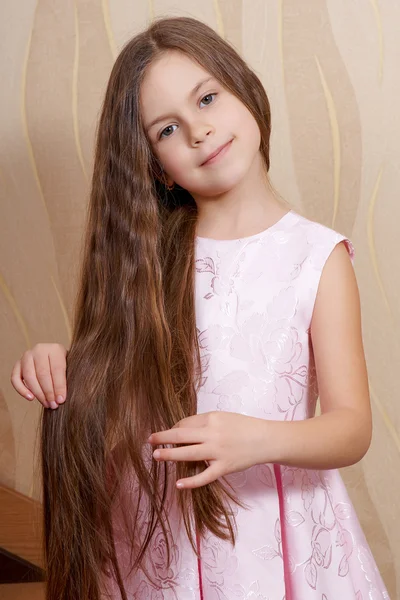 Little girl with a long hair — Stock Photo, Image