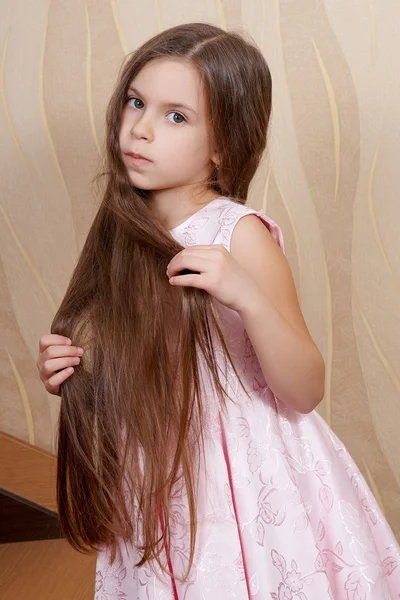 Little girl with a long hair — Stock Photo, Image