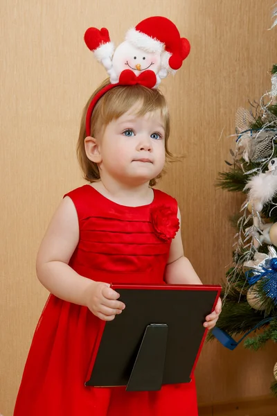 Cute girl in red dress — Stock Photo, Image