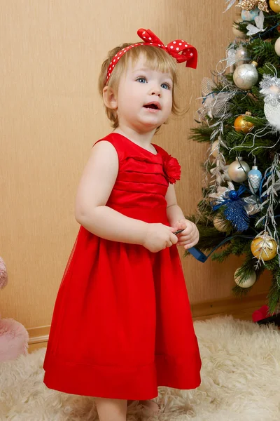 Cute girl in red dress — Stock Photo, Image