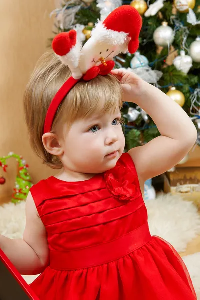 Cute girl in red dress — Stock Photo, Image