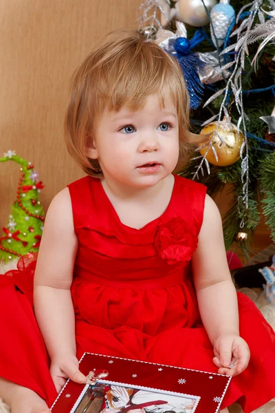 Cute girl in red dress — Stock Photo, Image