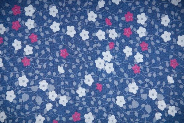Tekstura tkanina tło z kwiatami — Zdjęcie stockowe
