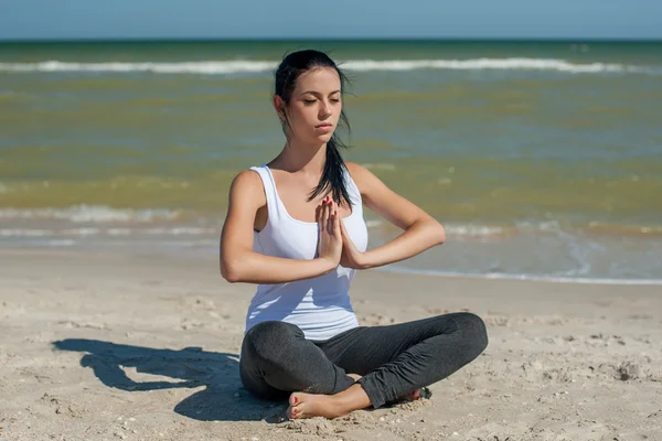 Young woman practicing yoga Stock Image