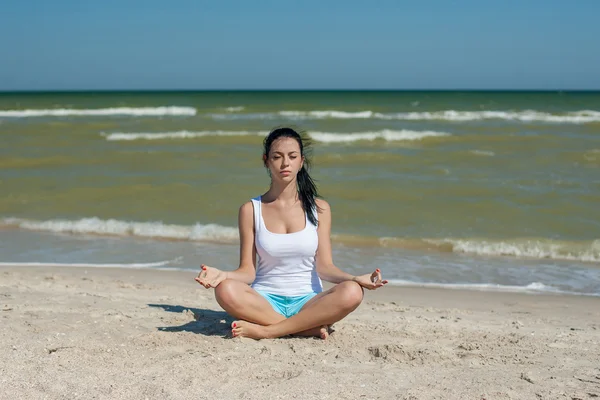 Young woman practicing yoga Royalty Free Stock Images