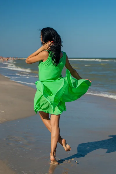 Young cheerful girl on the sea — Stock Photo, Image