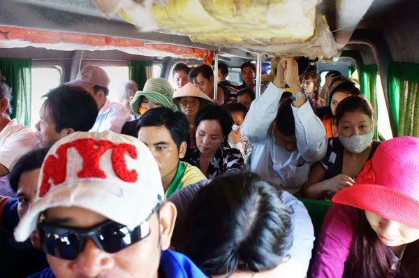 Passenger sit in overcrowded on passenger boat. CA MAU, VIET NAM- JUNE 29, 2013 — Stock Photo, Image