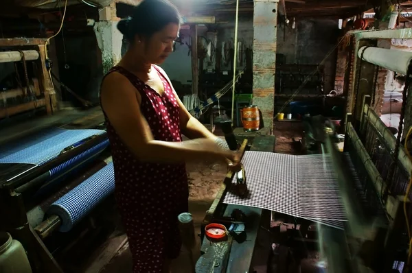 Weaving striped cloth by power loom — Stock Photo, Image