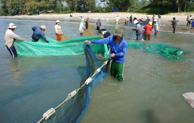 plaj fisherman takım çalışması