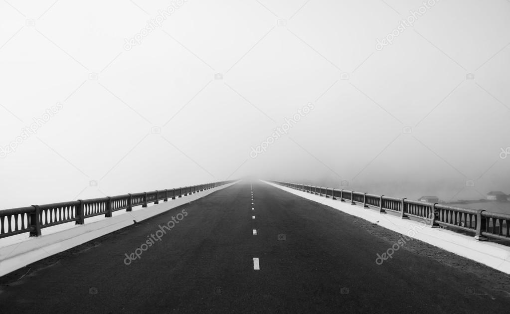 Road, way like arrow, direction to future in fog