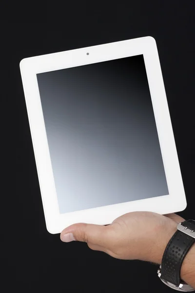 Tenendo il tablet digitale con una mano — Foto Stock