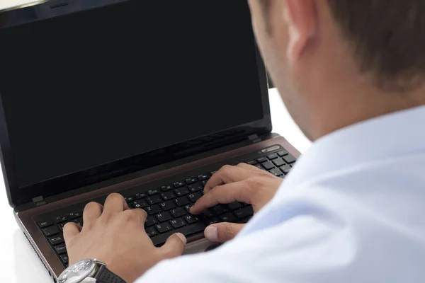 Typing on the laptop in the office — Stock Photo, Image