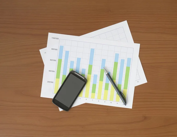 Chart, Pen and Smart Phone on the Worktable — Stock Photo, Image