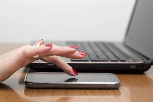 Lady's fingers touch the smart phone — Stock Photo, Image