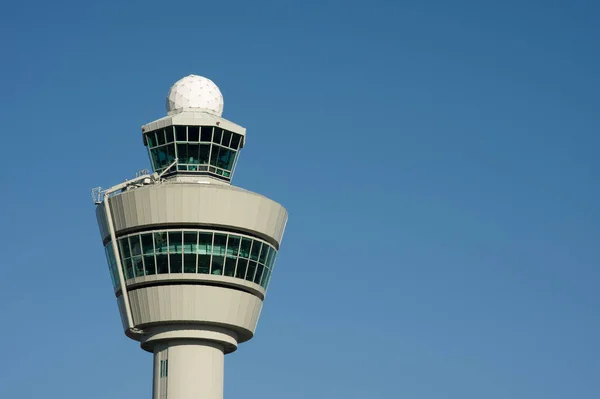 Air traffic ontrol tower for flights managment at airport Schiphol in the Netherlands