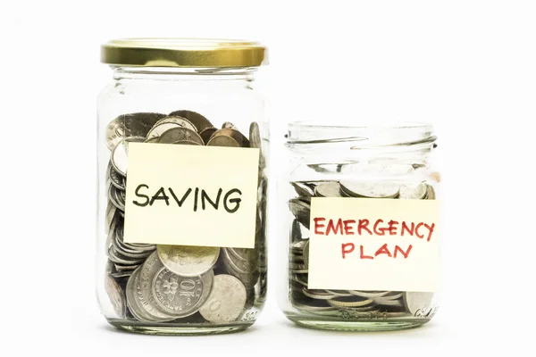 Isolated coins in jar with emergency plan and emergency plan label — Stock Photo, Image